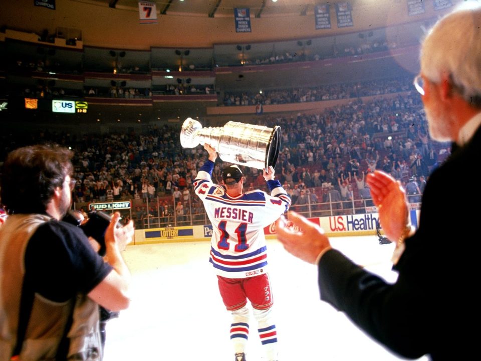 Mark Messier lifting the Stanley Cup at Madison Square Garden