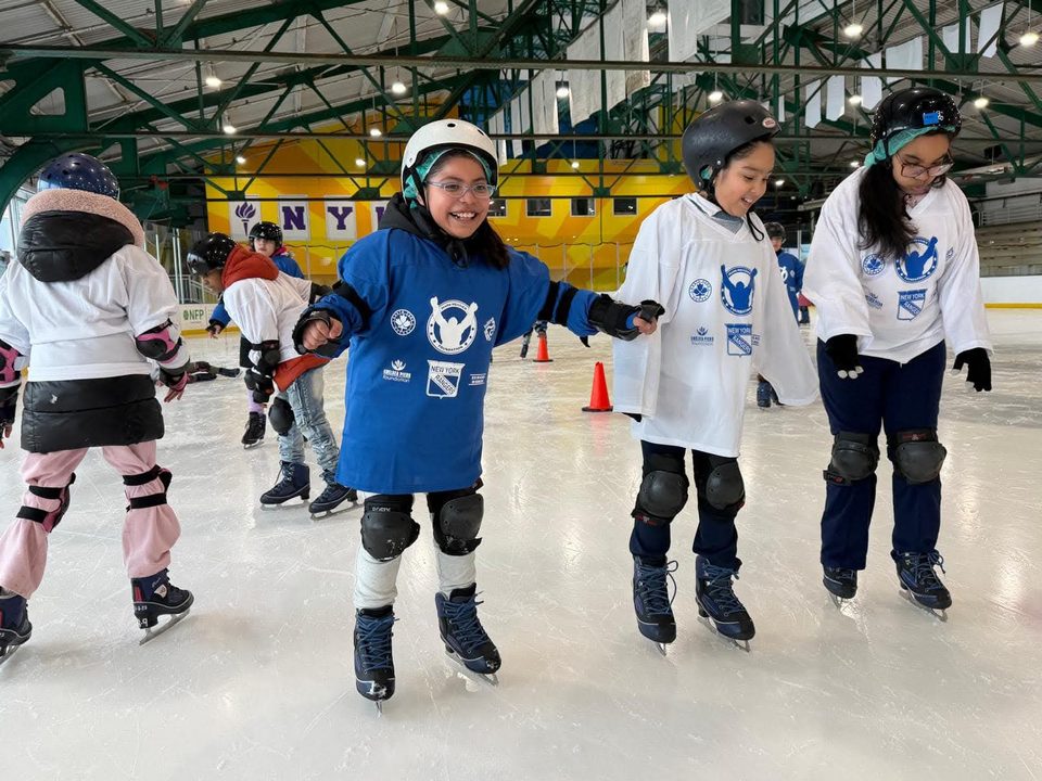 North Park skaters in a line on the ice